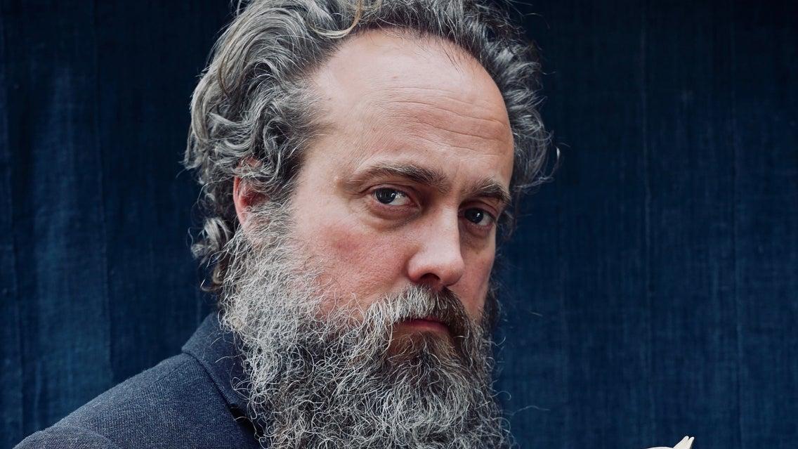 Promotional graphic for Iron & Wine